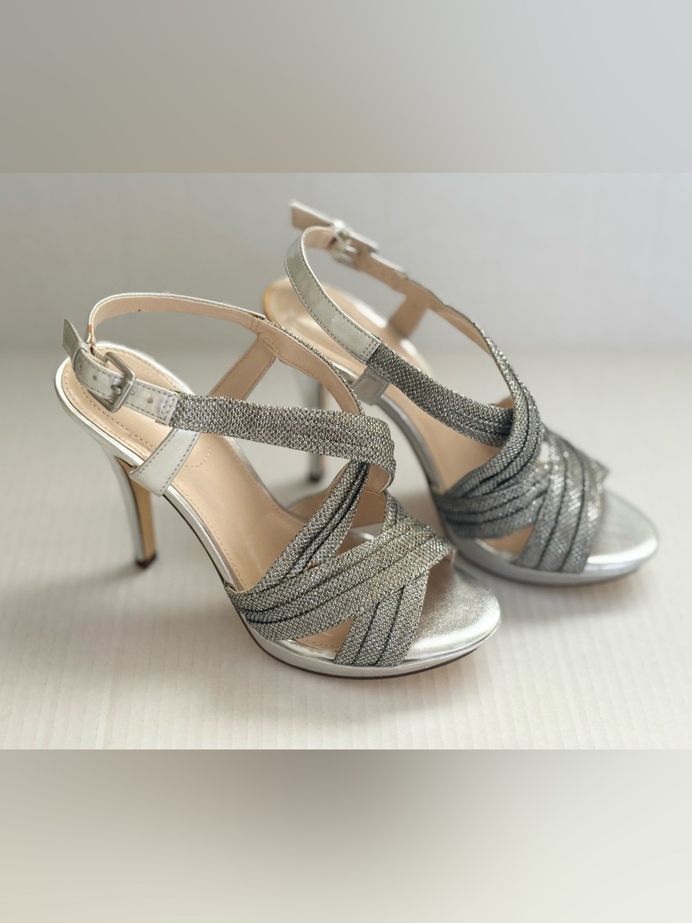 Maripe Silver Elegant Strappy High Heel Sandals in size 7 heels 4” high.